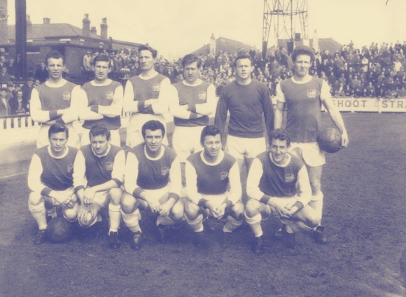 Brighton's Fourth Division championship side of 1964/65. Back row left to right; Bertolini, Baxter, Hopkins, Turner, Powney, Hennigan. Front row left to right; Gould, Collins, R. Smith, J.Smith, Goodchild.
