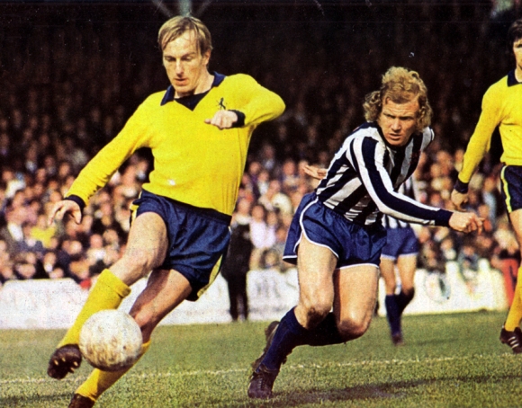 Eddie Spearritt challenges for the ball with Villa's Ray Graydon