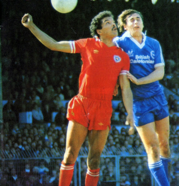 Future Albion defender Larry May in a duel with scorer Michael Robinson